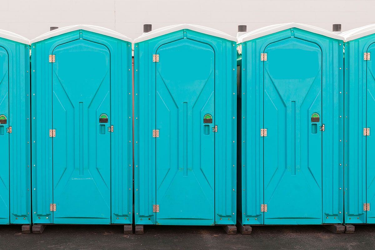 Industrial portable restroom units at a plant in Mason, Michigan